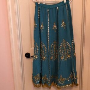 Blue Skirt with red and gold embroidery